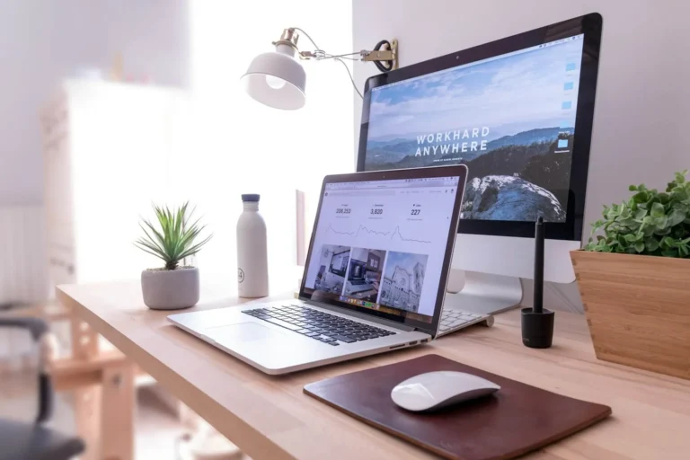 Modern workspace with laptop and desktop computer
