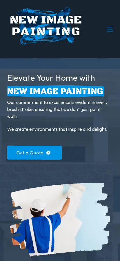 Painter working on a house wall.