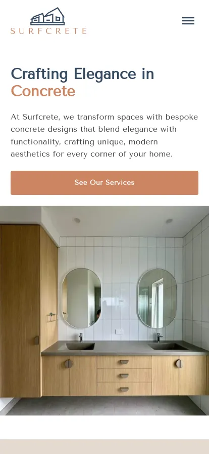 Modern bathroom with concrete countertops and mirrors