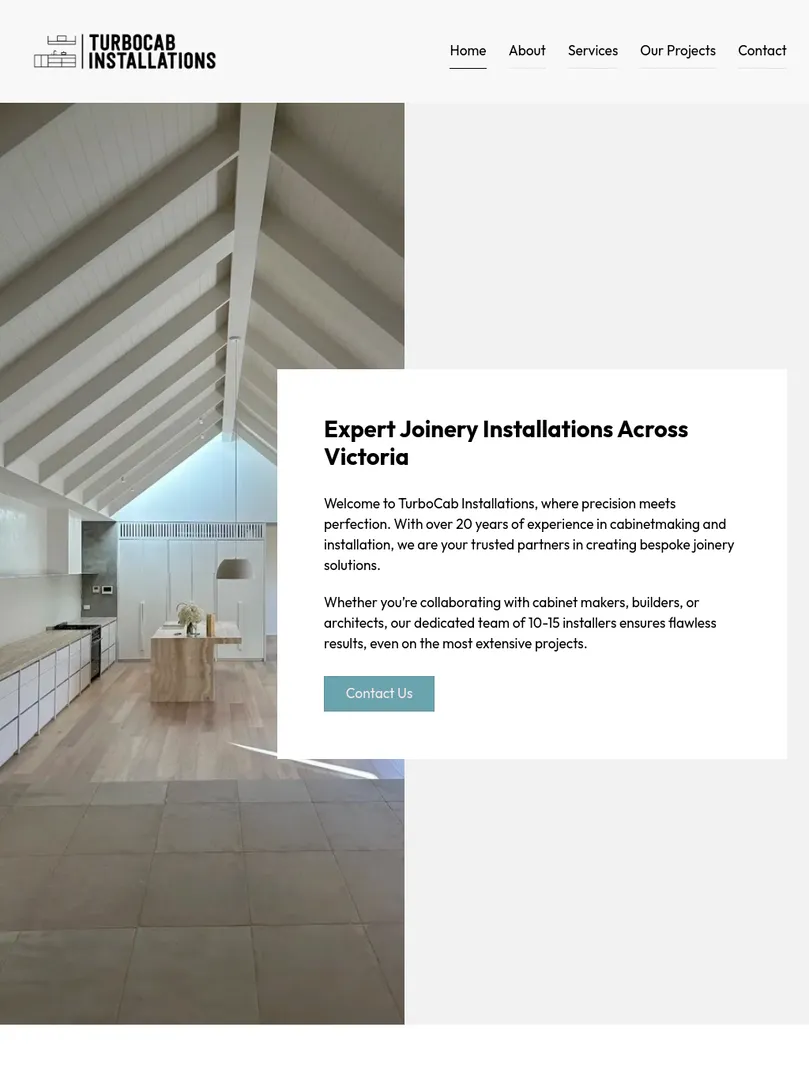 Modern kitchen interior with vaulted ceiling.