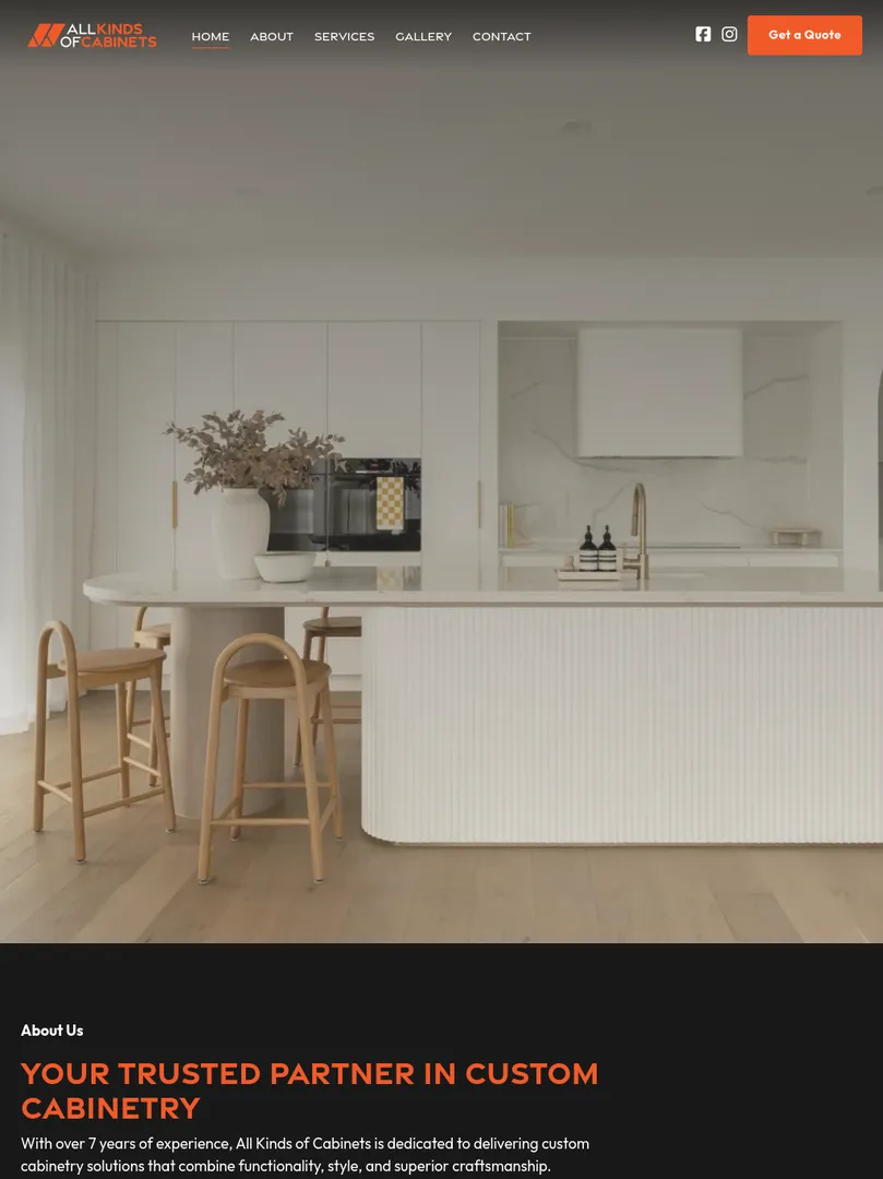 Modern kitchen with white cabinets and island.
