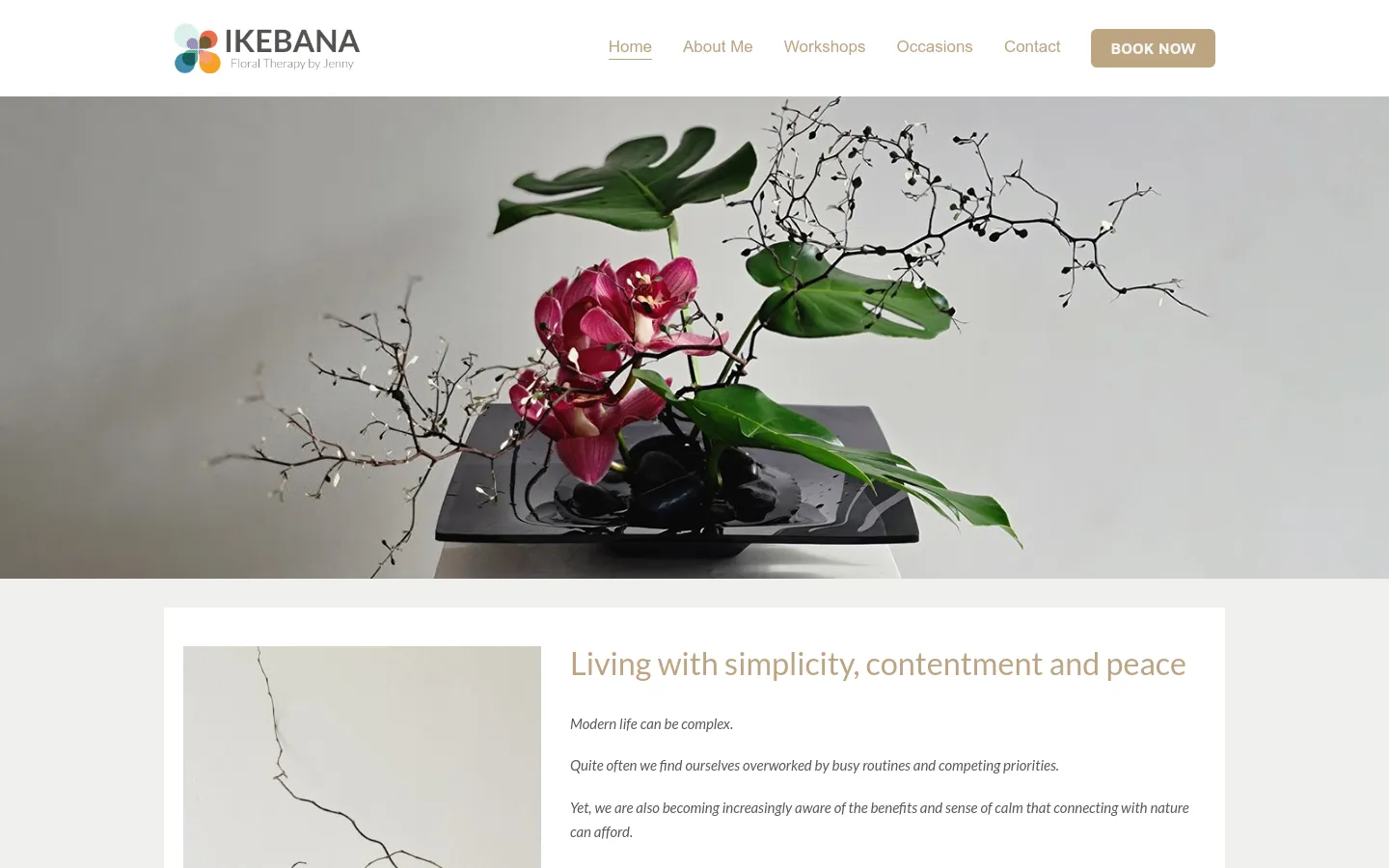 Ikebana flower arrangement with pink orchids