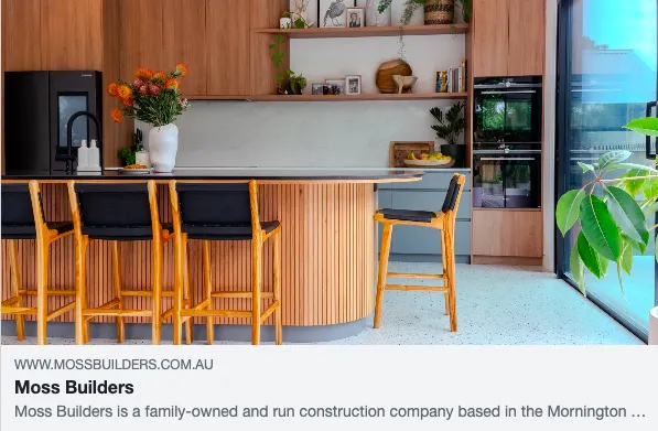 Modern kitchen with wooden island and barstools