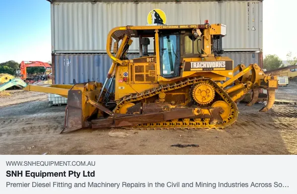 Yellow bulldozer at construction site