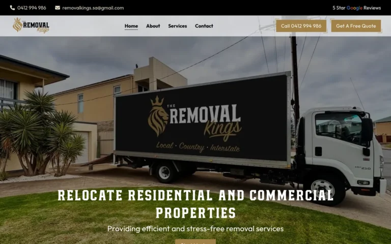 Removal truck parked in front of a house.