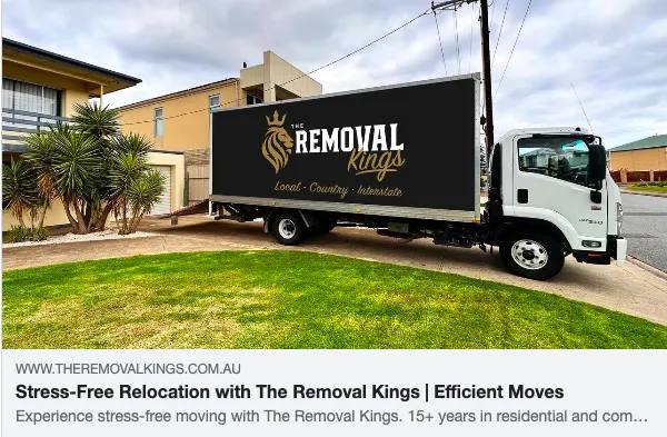 Removal Kings truck parked outside a house