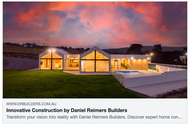 Modern house at sunset with vibrant sky.